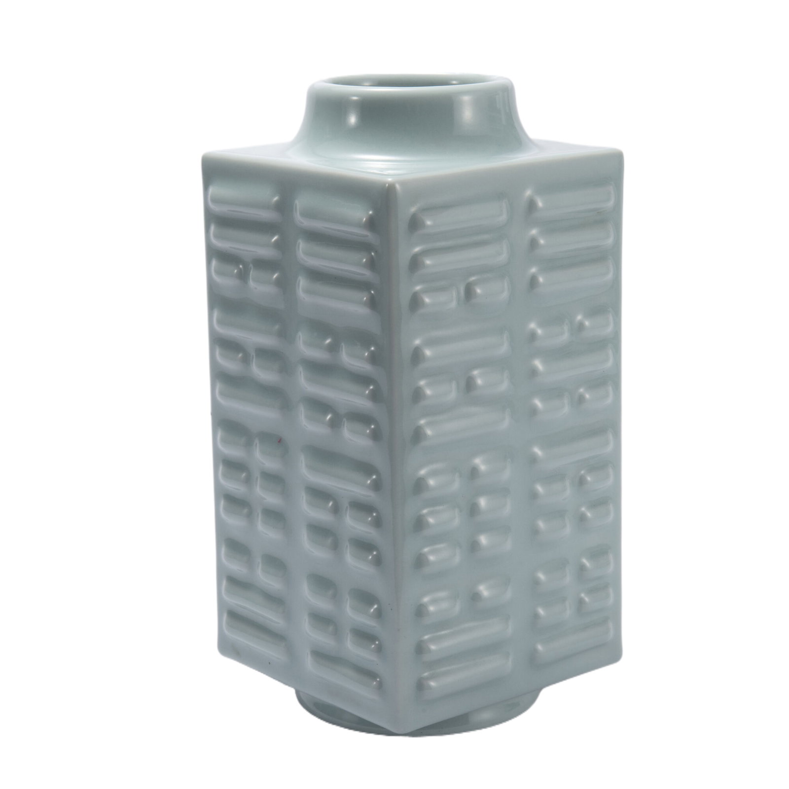A CHINESE CELADON GLAZE PORCELAIN CONG VASE: A CHINESE CELADON GLAZE PORCELAIN CONG VASE The body, of square section, is decorated in relief on each side with the Eight Trigrams, bagua, and covered overall with a pale bluish-green glaze. Dimensi