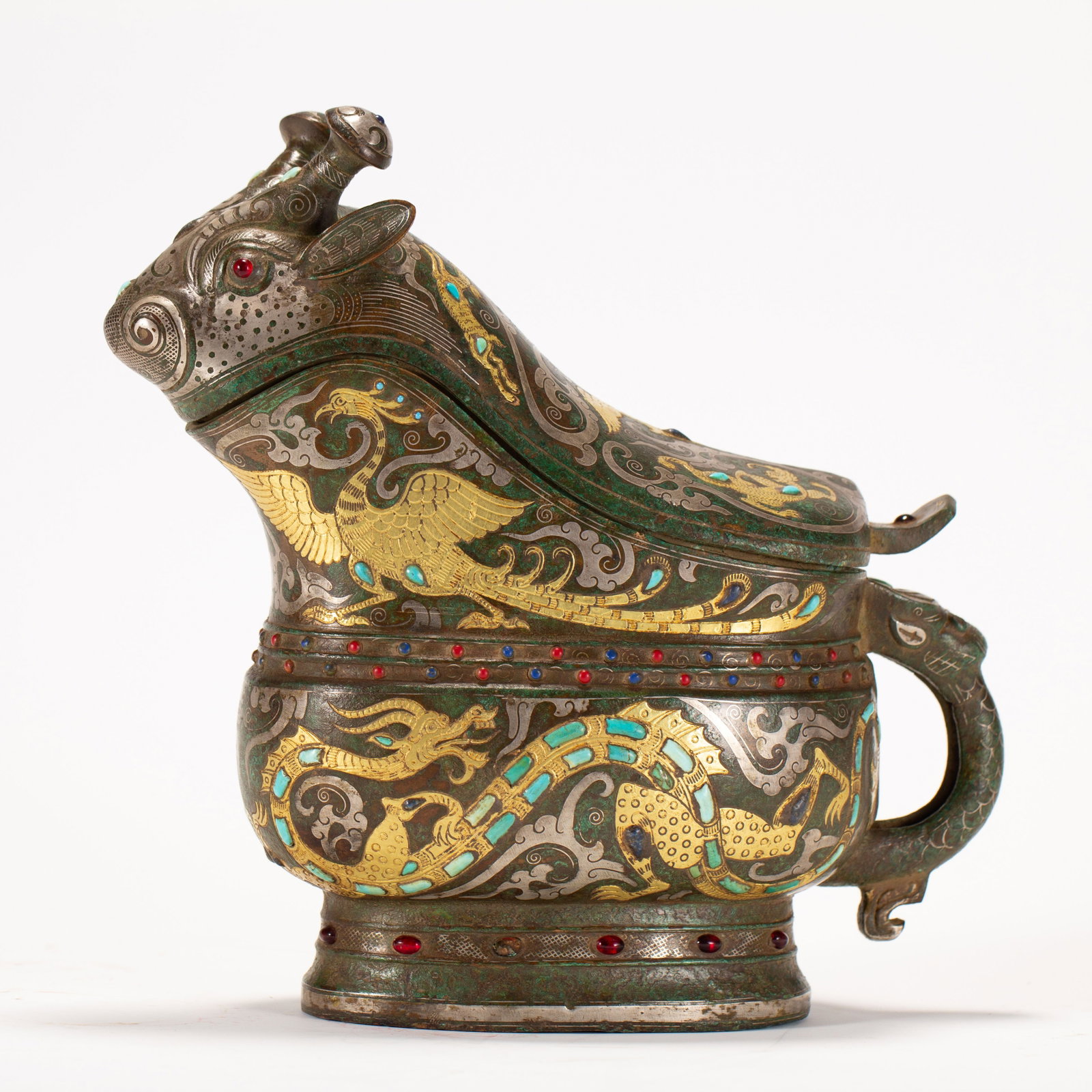 Chinese Bronze Ritual Wine Vessel with Gold, Silver, and Turquoise Inlay: Chinese Bronze Ritual Wine Vessel with Gold, Silver, and Turquoise Inlay A magnificent archaic-style bronze gong wine vessel, masterfully decorated with elaborate gold and silver inlay depicting styli