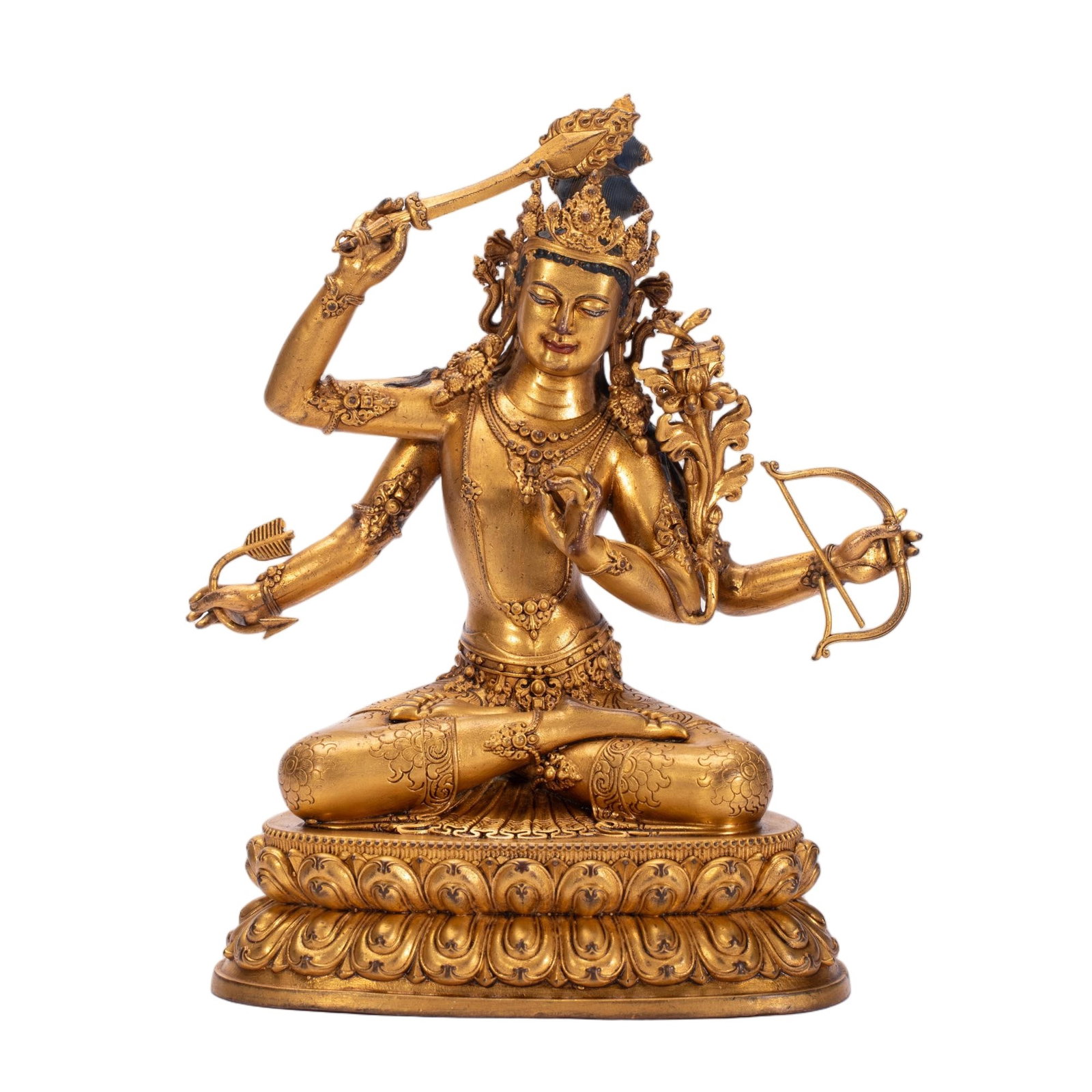 Chinese Gilt Bronze Four-Armed Manjushri Statue: Chinese Gilt Bronze Four-Armed Manjushri Statue This is a finely cast Chinese gilt bronze statue of the four-armed Manjushri, measuring 17 cm in length, 9.5 cm in width, and 20 cm in height, weighing