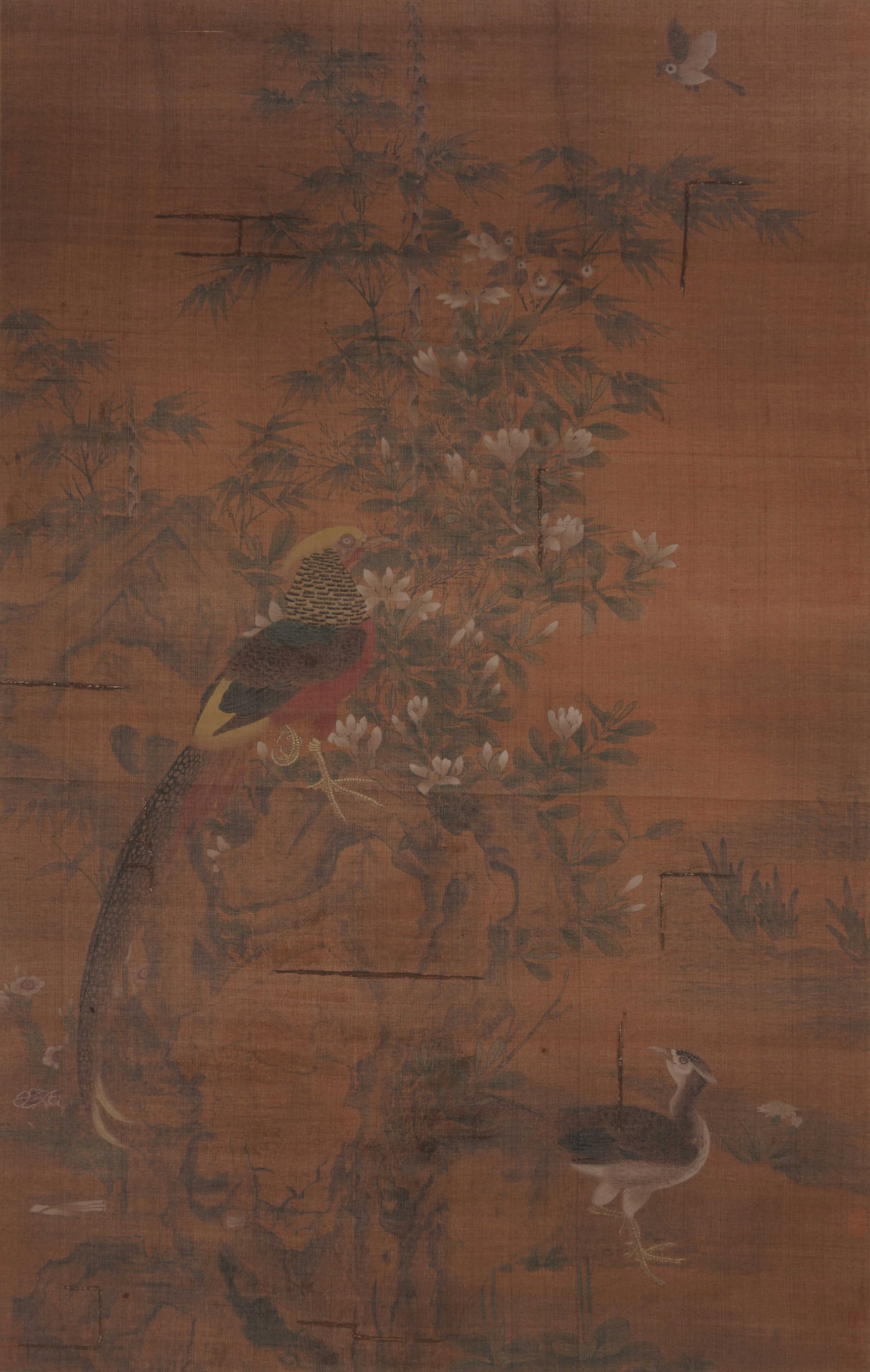 A CHINESE CLASSICAL BIRD-AND-FLOWER PAINTING, ANONYMOUS: A CHINESE CLASSICAL BIRD-AND-FLOWER PAINTING, ANONYMOUS Ink and colour on silk, hanging scroll. This anonymous work depicts a vibrant natural scene, featuring a golden pheasant perched on a scholar's 