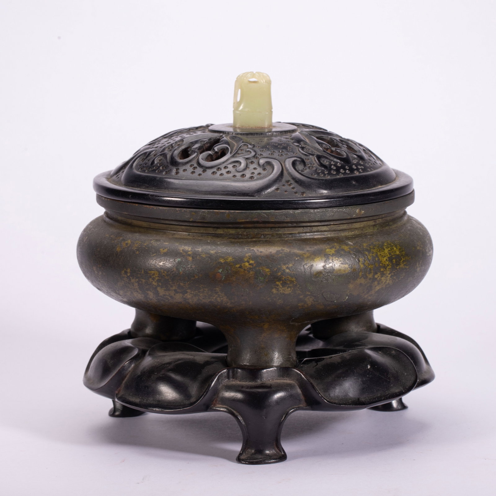 Chinese Bronze Tripod Censer with Jade Finial: Chinese Bronze Tripod Censer with Jade Finial This elegant bronze tripod censer measures 15 cm in length, 15 cm in width, 15 cm in height, and weighs 1960 grams. The rounded body is supported by three