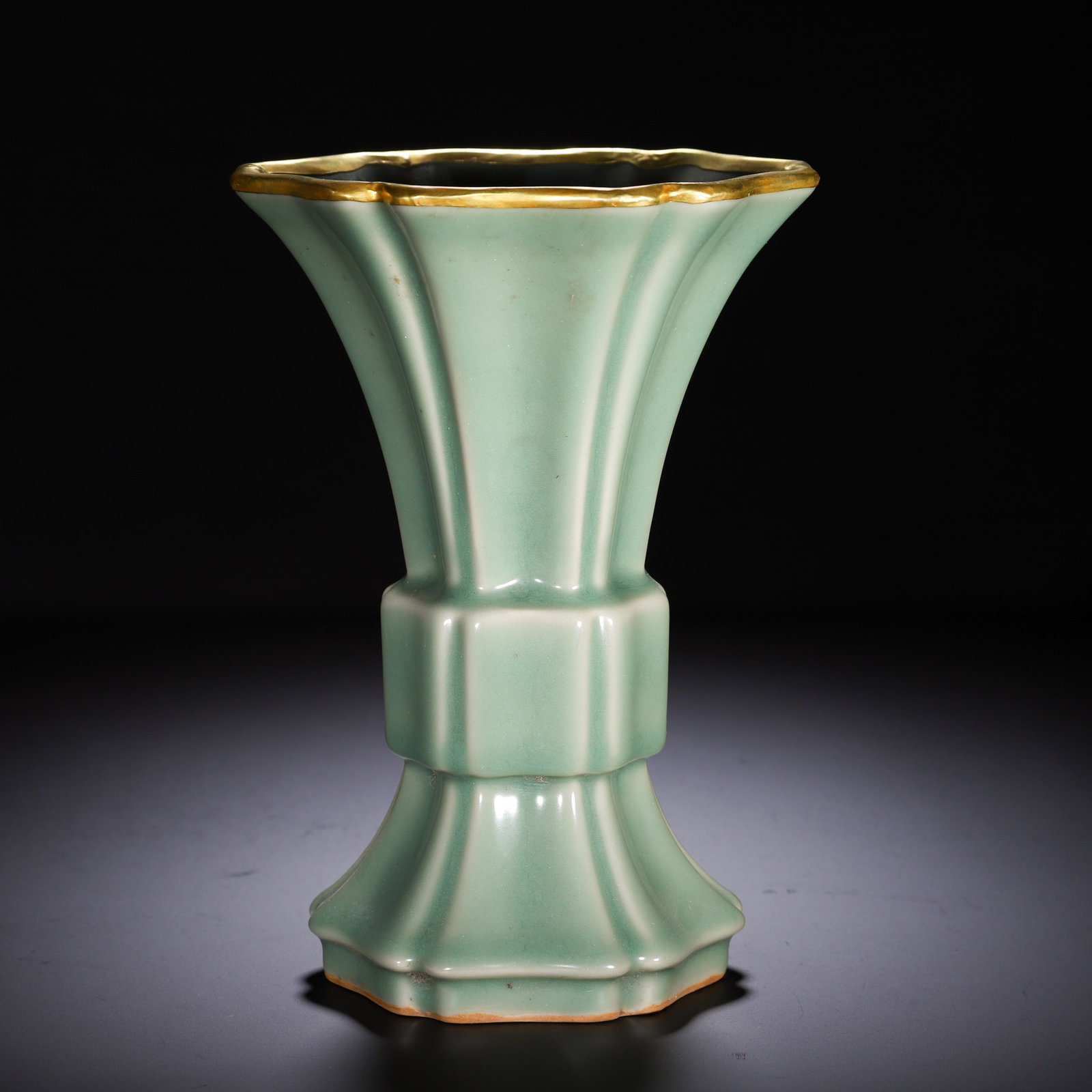 Chinese Celadon Gu-Form Vase with Gilt Rim: Chinese Celadon Gu-Form Vase with Gilt Rim This elegant celadon gu-form vase measures 14 cm in length, 14 cm in width, 21 cm in height, and weighs 970 grams. The faceted, lobed body is covered in a sm