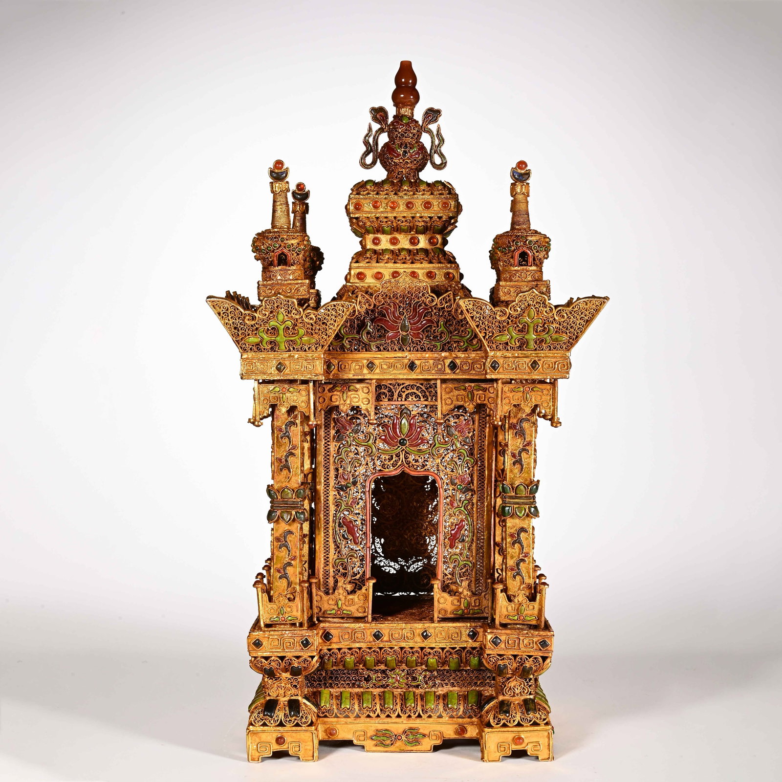 Chinese Gilt Bronze Filigree Buddhist Shrine: Chinese Gilt Bronze Filigree Buddhist Shrine This magnificent gilt bronze Buddhist shrine measures 36 cm in height and 19 cm in width. Crafted using the intricate filigree technique, it is adorned wit