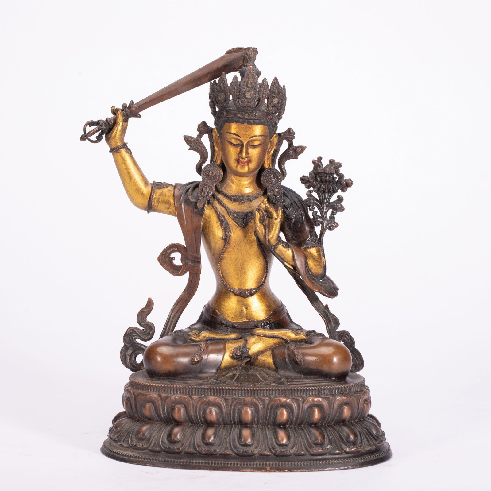 Chinese Gilt Bronze Statue of Manjushri: Chinese Gilt Bronze Statue of Manjushri This finely crafted copper and gilt bronze statue of Manjushri measures 11.5 cm in length, 8.5 cm in width, 16 cm in height, and weighs 550 grams. The bodhisatt