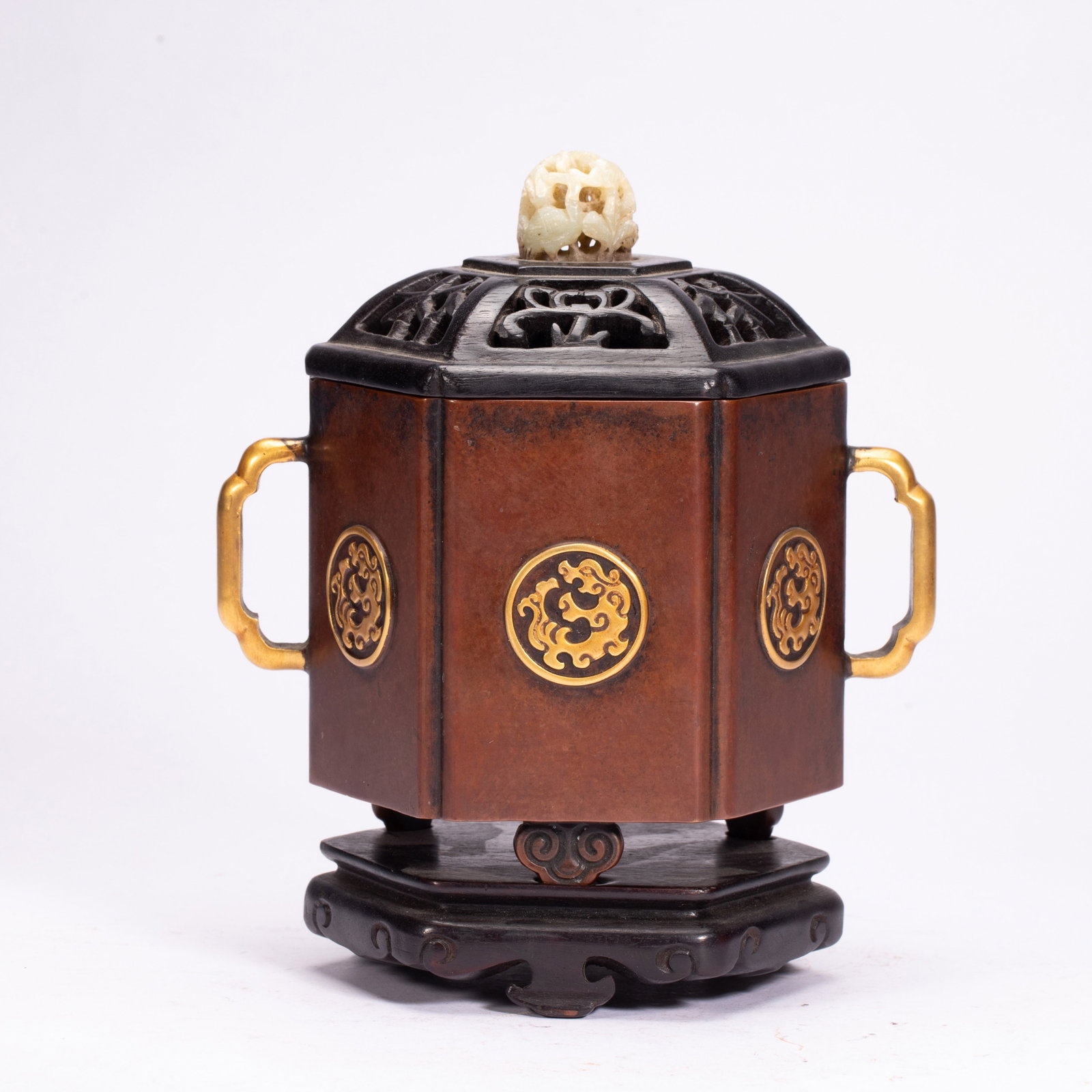 Chinese Bronze Hexagonal Incense Burner with Gilt Details: Chinese Bronze Hexagonal Incense Burner with Gilt Details This is an exquisite Chinese hexagonal bronze incense burner, measuring 16 cm in length, 10 cm in width, and 19 cm in height, weighing 2190 gr