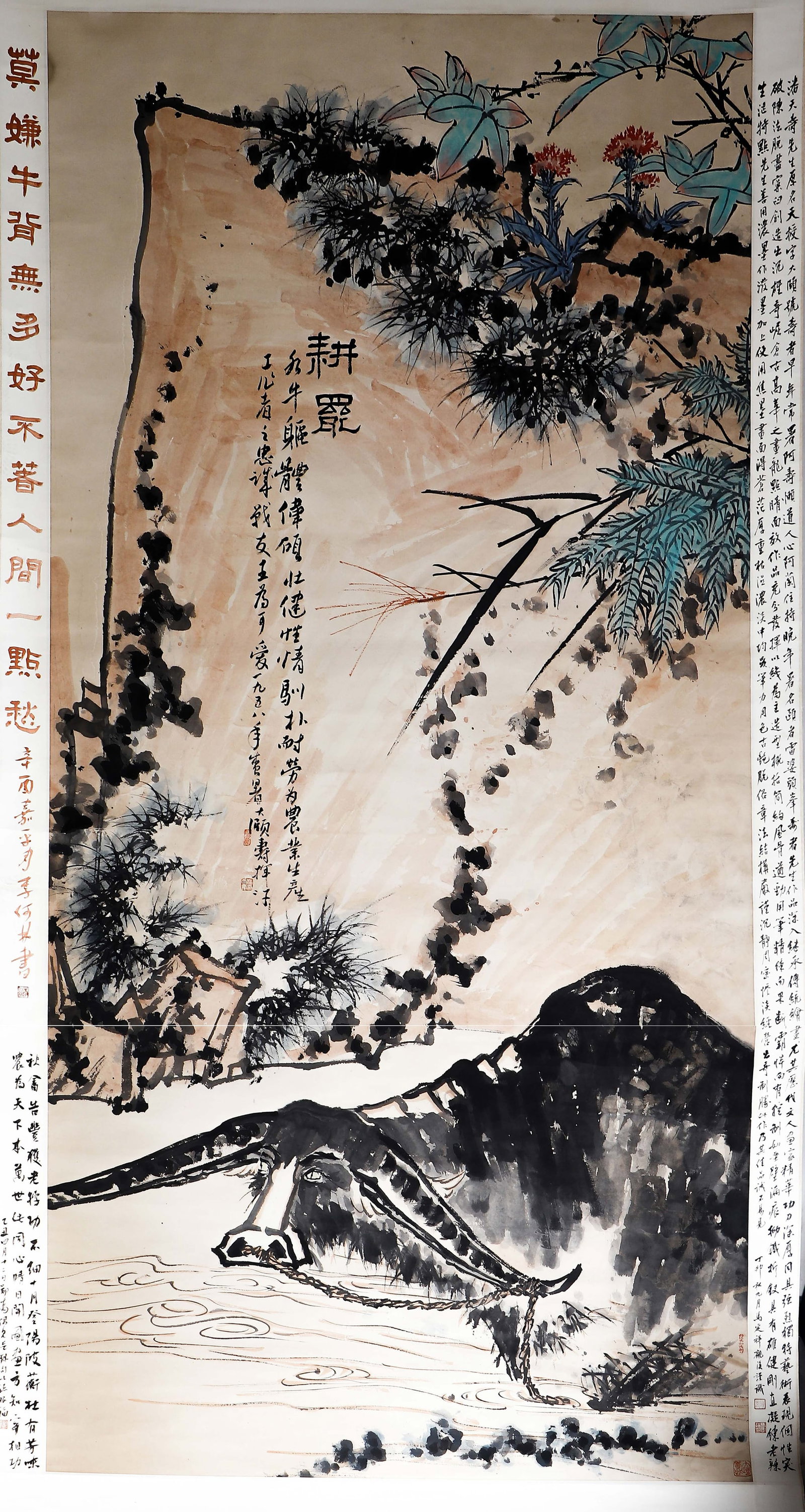 A CHINESE PAINTING OF BUFFALO, SIGNED PAN TIANSHOU: A CHINESE PAINTING OF BUFFALO, SIGNED PAN TIANSHOU Ink and colour on paper, hanging scroll. Dated 1958, this monumental work depicts a water buffalo resting by the water, a symbol of diligence in
