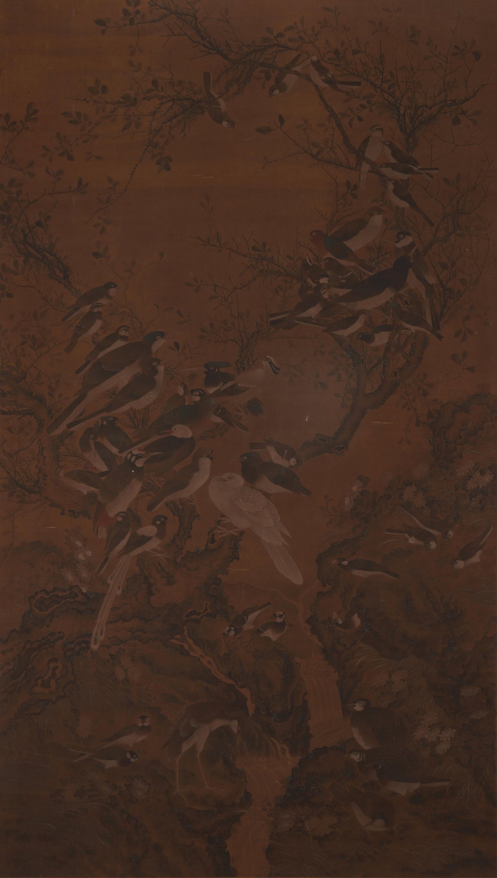 A CHINESE PAINTING OF HUNDREDS OF BIRDS, ANONYMOUS: A CHINESE PAINTING OF HUNDREDS OF BIRDS, ANONYMOUS Ink on silk, hanging scroll. This rare anonymous "hundred birds? painting depicts a lively assembly of various avian species, including songbirds,