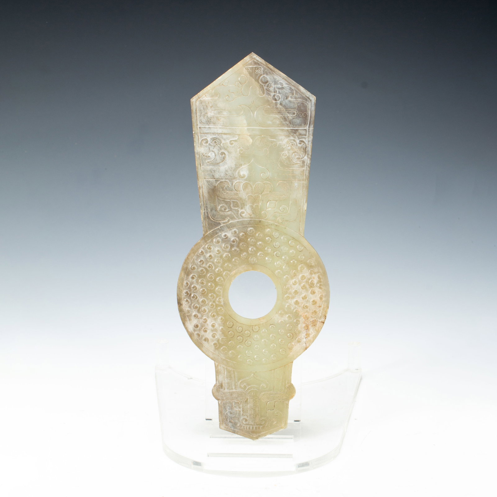 Chinese Hetian Jade Bi Disc Ornament: Chinese Hetian Jade Bi Disc Ornament This is a fine Chinese Hetian jade bi disc ornament, measuring 28 cm in length and 11 cm in width, weighing 250 grams. The vertically oriented piece features a cen