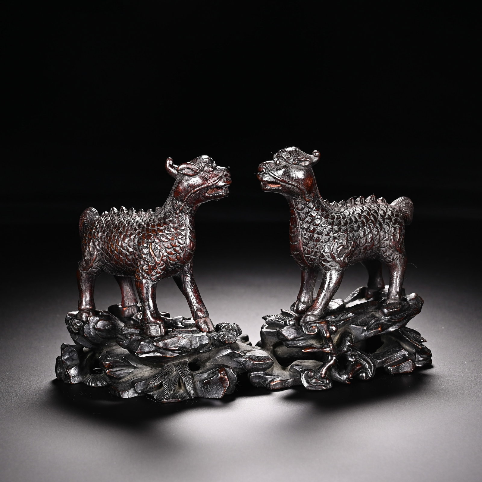 A Pair of Chinese Agarwood Qilin Ornaments (1 of 8)