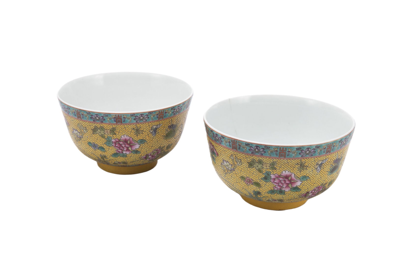 PAIR CHINESE FALANGCAI PEONY BOWLS: PAIR CHINESE FALANGCAI PEONY BOWLS The deep rounded sides rising from a circular foot to the rim, the exterior decorated with peony spray in famille rose agaisnt yellow ground. Dimension: L. 12 cm. H.