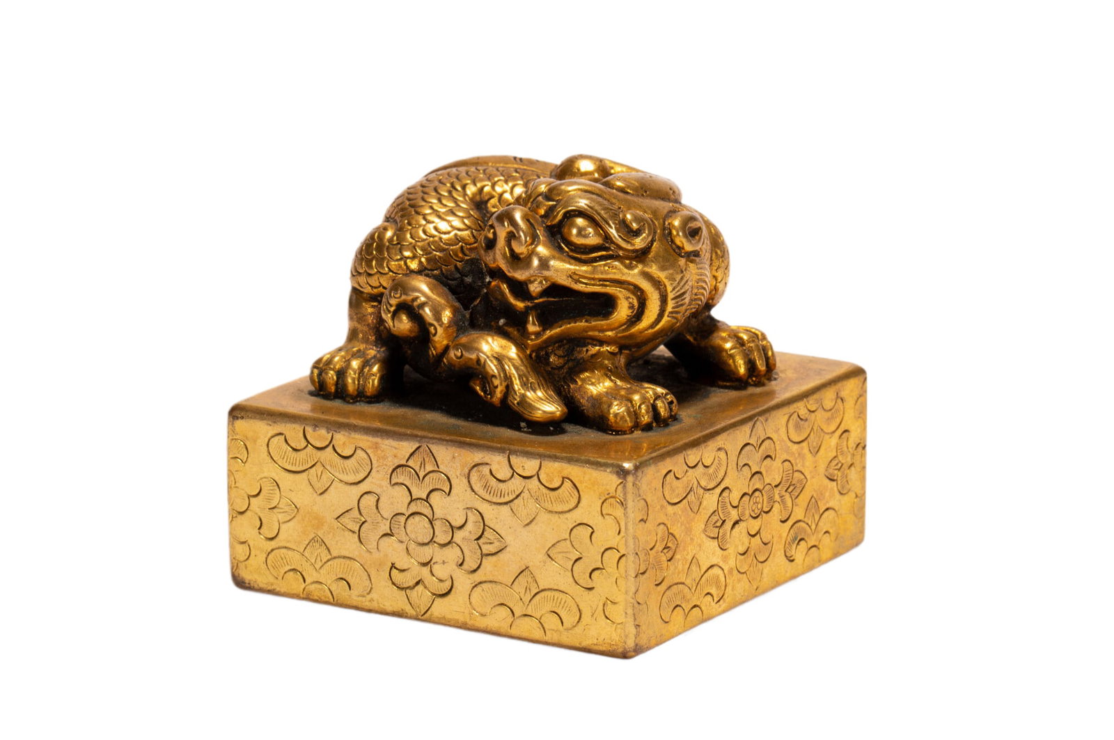 Chinese Gilt-Bronze Mythical Beast Seal: Chinese Gilt-Bronze Mythical Beast Seal A heavy square seal cast in gilt bronze, surmounted by a powerfully rendered mythical beast in a crouched pose. The beast is detailed with textured scales, fier