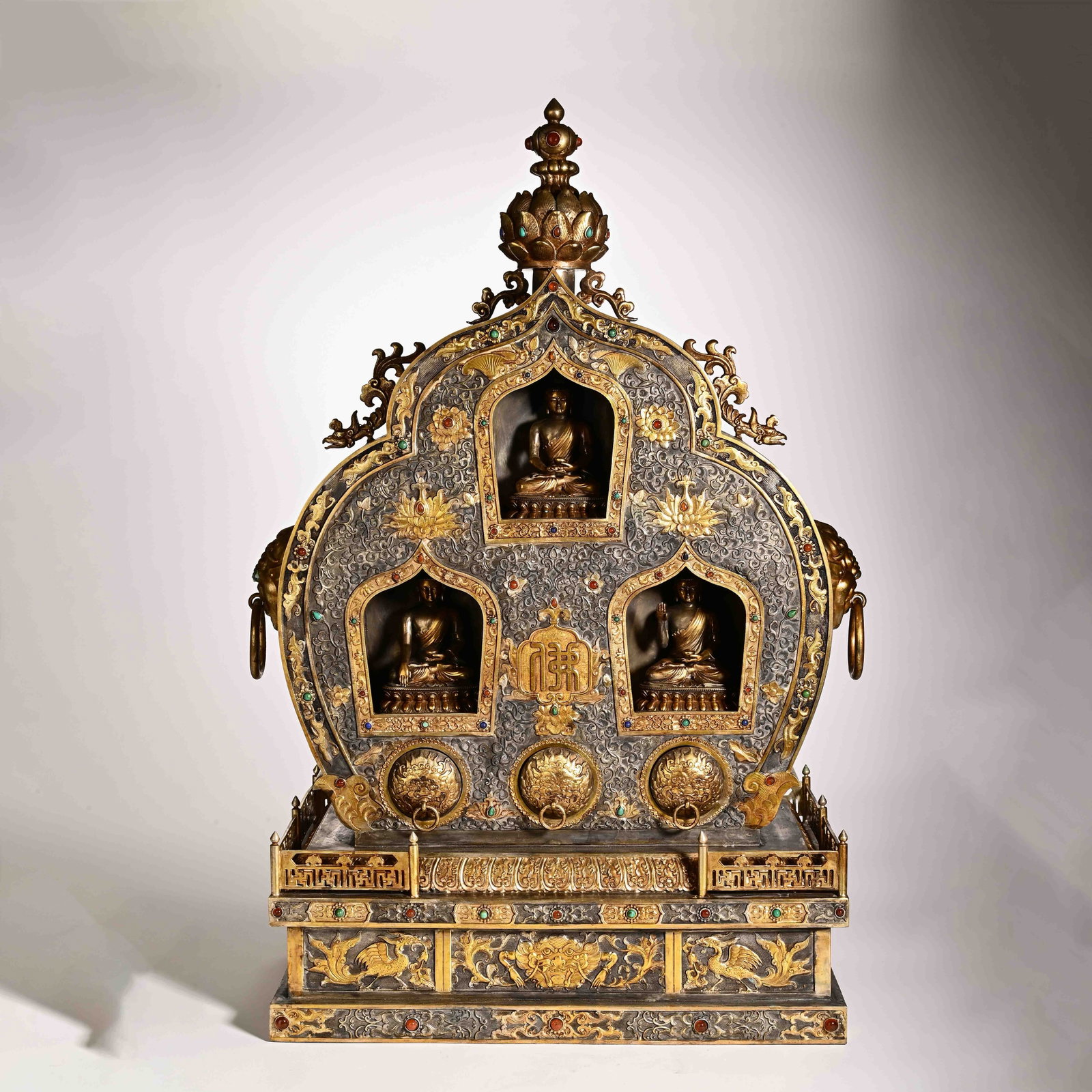Chinese Silver & Gilt Bronze Buddhist Shrine: Chinese Silver & Gilt Bronze Buddhist Shrine This magnificent silver and gilt bronze Buddhist shrine measures 60 cm in height and 36 cm in width. The shrine's main body is crafted from hammered silver