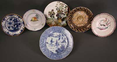 A Collection of Six Various Decorative Plates; a l: A Collection of Six Various Decorative Plates; a late 18th century blue & white Delft plate painted with flowers & edged in a yellow rim line 9 ins (23 cms) in diameter, a Faience soup plate decorated