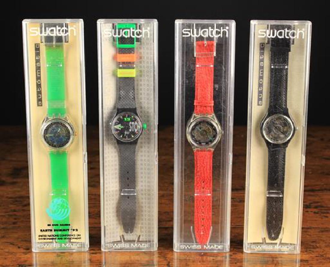 Three Automatic Swatch Watches; An 'Earth Summit '92',: Three Automatic Swatch Watches; An 'Earth Summit '92', a 'Black Sharkskin' and a 'Red Crocodile', along with a Swatch Stop Watch with black 'divers' strap. All with original boxes (one lacking backing