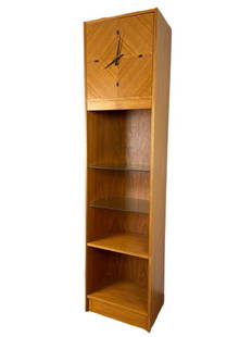 Danish Modern Teak Floor Clock: 71" H x 12" D x 18" wide (approximately). Battery powered floor clock with shelving and electric light for display. Tested and working. Made in Denmark sticker on back.