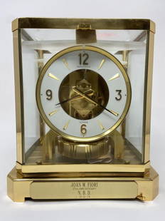 Jaeger Le Coultre ATMOS Clock w/ Movement Guard: Serial number 383501. The movement guard is still in place so it is our belief that this clock has never been used. The clock has been inscribed on a plaque for a 25th anniversary with a gift