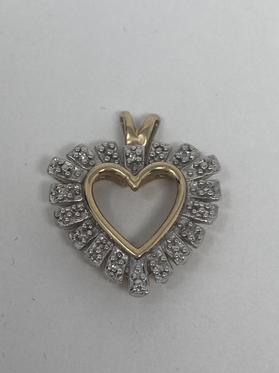 14K Gold Heart Pendant: 2.6 total grams. 3/4" approx width. Marked 14k. Acid tested 14k.