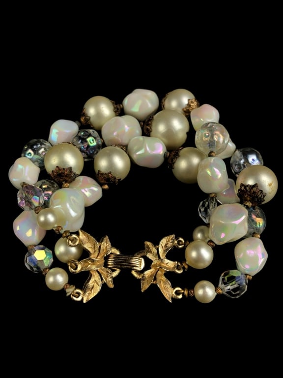 Vintage Crown Trifari Triple Strand Bracelet: 7.25"L. Marked Trifari with crown symbol.