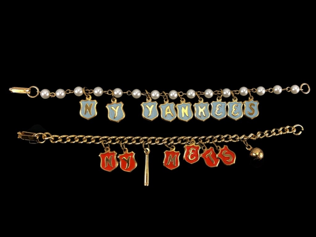 Vintage NY YANKEES & METS Charm Bracelets: Enamel & Brass tone metal. Yankees bracelet has faux pearls. Mets bracelet measures 6.5". Yankees bracelet measures 7". Both are in good condition.