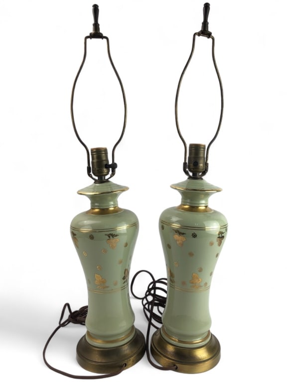20th C. Porcelain Celandine Green Baluster Lamps: Hand Painted gold leaf to design (possibly European). 28" H to the top of the harps. No chips or cracks. Small areas of loss to the gold paint. Lamps are in working condition.L4