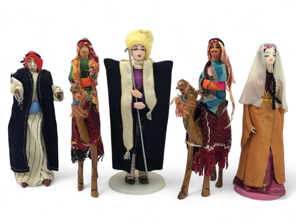 Collection of Hand Crafted Middle Eastern Dolls: Average Height 8" Carved & painted wood with cloth and metal chain.
