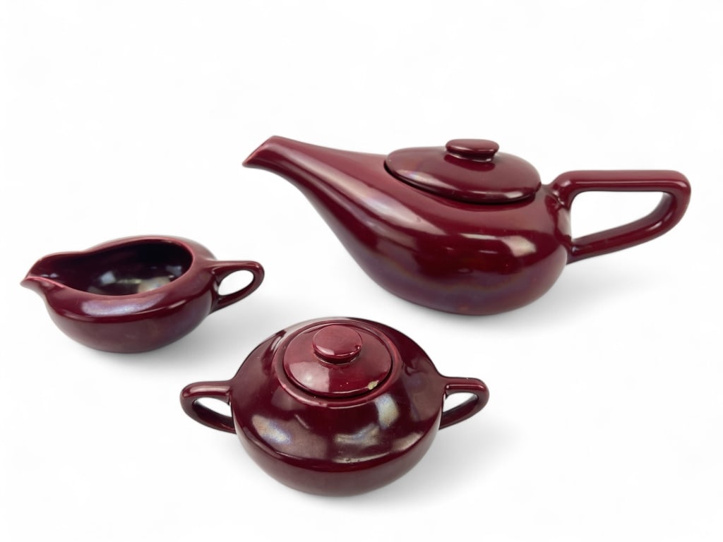 Vintage MCM Bauer Pottery-Style Aladdin Tea Set: teapot w/lid is 13.5” long - creamer 6 1/4” long - sugar bowl w/lid is 6.5” long - all measurements include handles - some chips on each item (see photos)