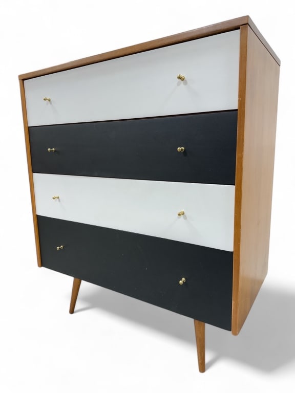 Paul McCobb Planner Group Chest Of Drawers: Paul McCobb Planner Group chest of drawers for Winchendon. Mid-century modern design. Constructed with a wood frame and iconic splayed legs. Finished in alternating black and white drawer fronts with
