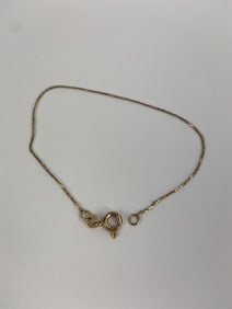 14K gold Italy bracelet  .78g     7"