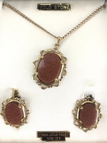 Vtg. goldstone necklace and earrings set in box