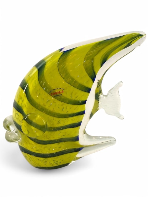 Signed Art Glass Sabina Rymanow Fish: Sabina Rymanow art glass fish sculpture, handmade in Poland. Features a vibrant yellow design with green and blue striations. Measures 6 3/8 inches tall. Signed on the body. Few light surface scratche