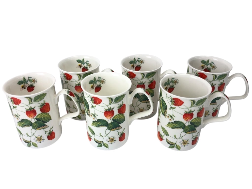 Set Of 6 Roy Kirkham Alpine Strawberry Mugs: Set of six Roy Kirkham fine bone china mugs in the ‘Alpine Strawberry’ design. Made in England, featuring vibrant strawberry and floral patterns. Small chip on rim of one mug. Approx. 4 x 3 inches