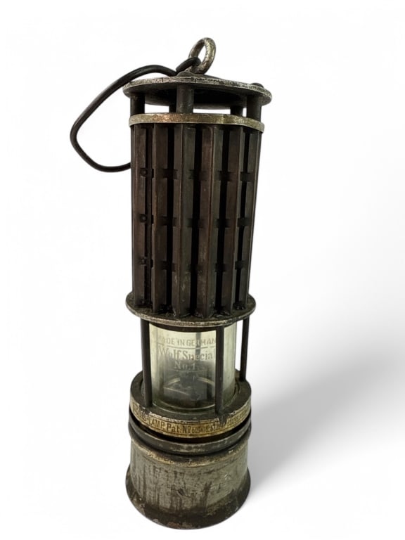 Antique Wolfs Mining Lamp From Germany: Antique Wolfs mining lamp, measuring approximately 11.25 inches in height. Made in Germany with visible markings that include 'Wolf Special No. 1' and patent numbers on the glass and metal bands.