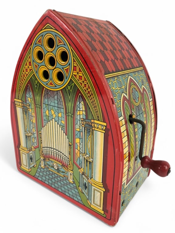 Vtg J Chein Crank Up Church Organ: Vintage J. Chein crank-up church organ toy, 9 3/8 inches tall, made in the USA. Tested and functions properly, with colorful lithographed tin construction and ornate details.