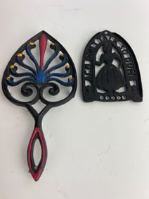 Two Decorative Cast Iron Trivets