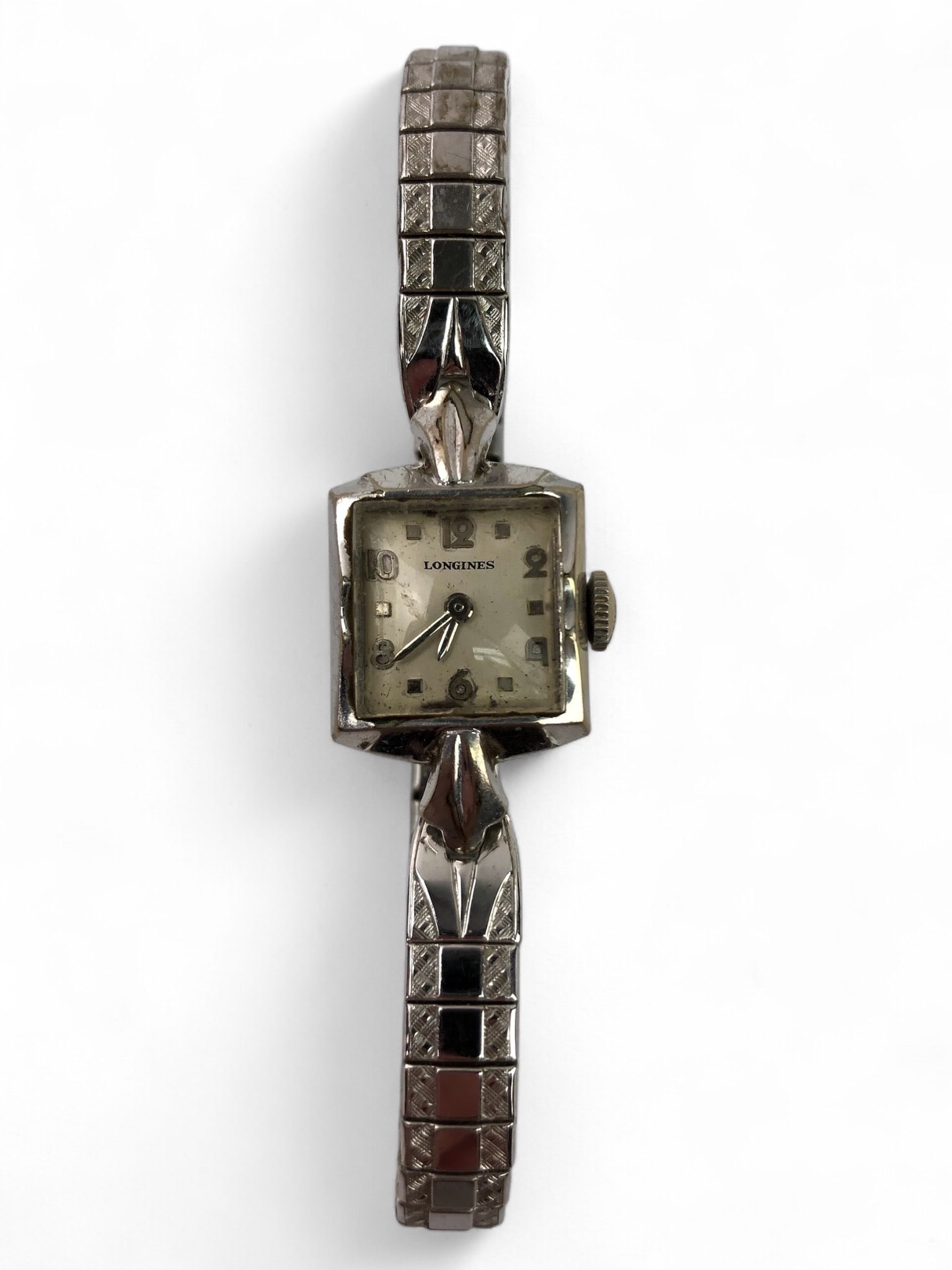 Longines 10K Gold Watch With Spiedel Band: Longines ladies' wristwatch with a 10K gold-filled case and a Spiedel USA expandable bracelet. Features a rectangular face with Arabic numerals and indices. Some wear and surface scratches present.