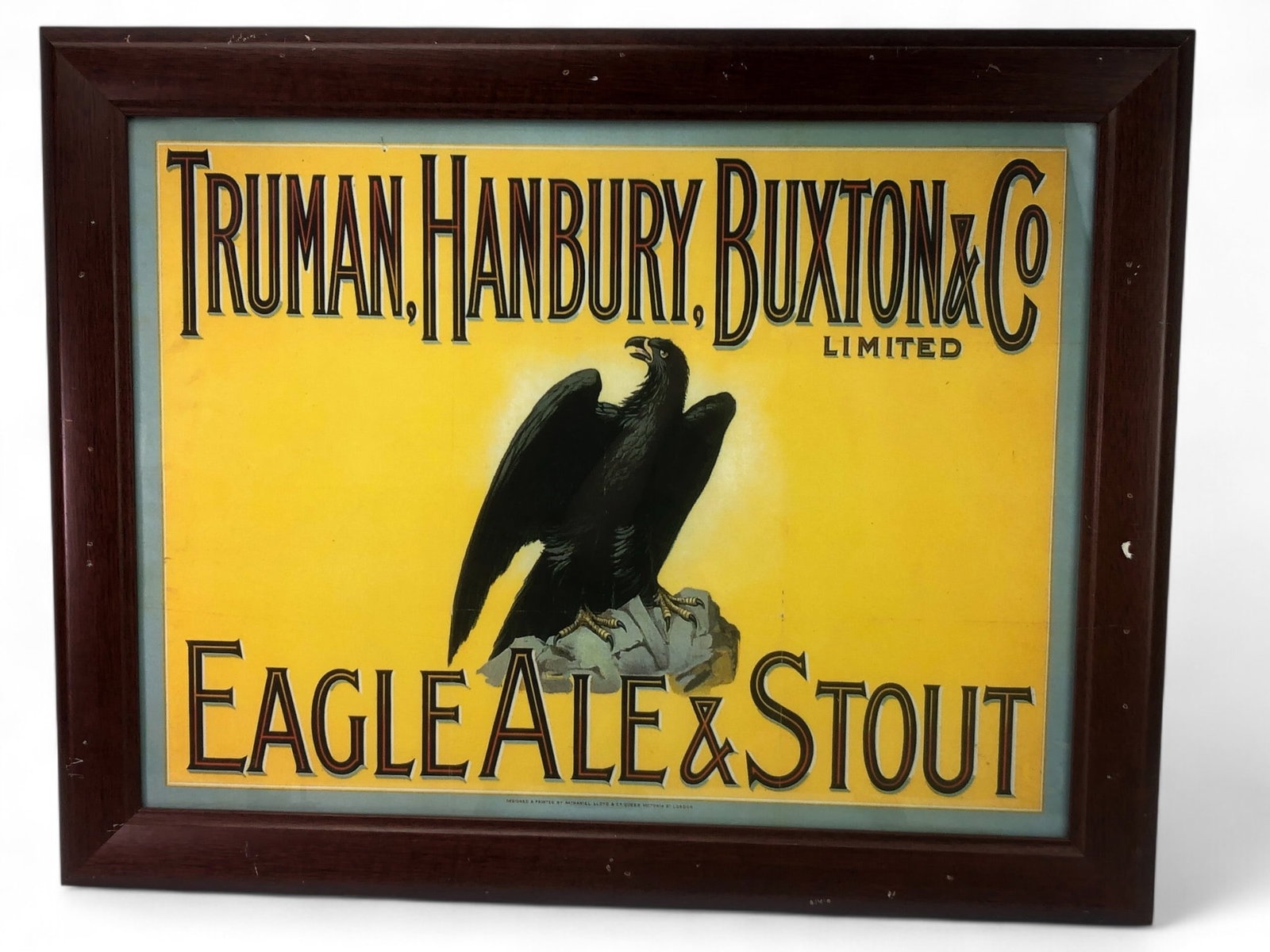 Framed Truman Hambury Buxton Poster: Framed reproduction poster of Truman, Hanbury, Buxton & Co promoting Eagle Ale & Stout. Measures 28" x 22" and printed by Nathaniel Lloyd & Co, Queen Victoria St, London. Features visible frame wear. 