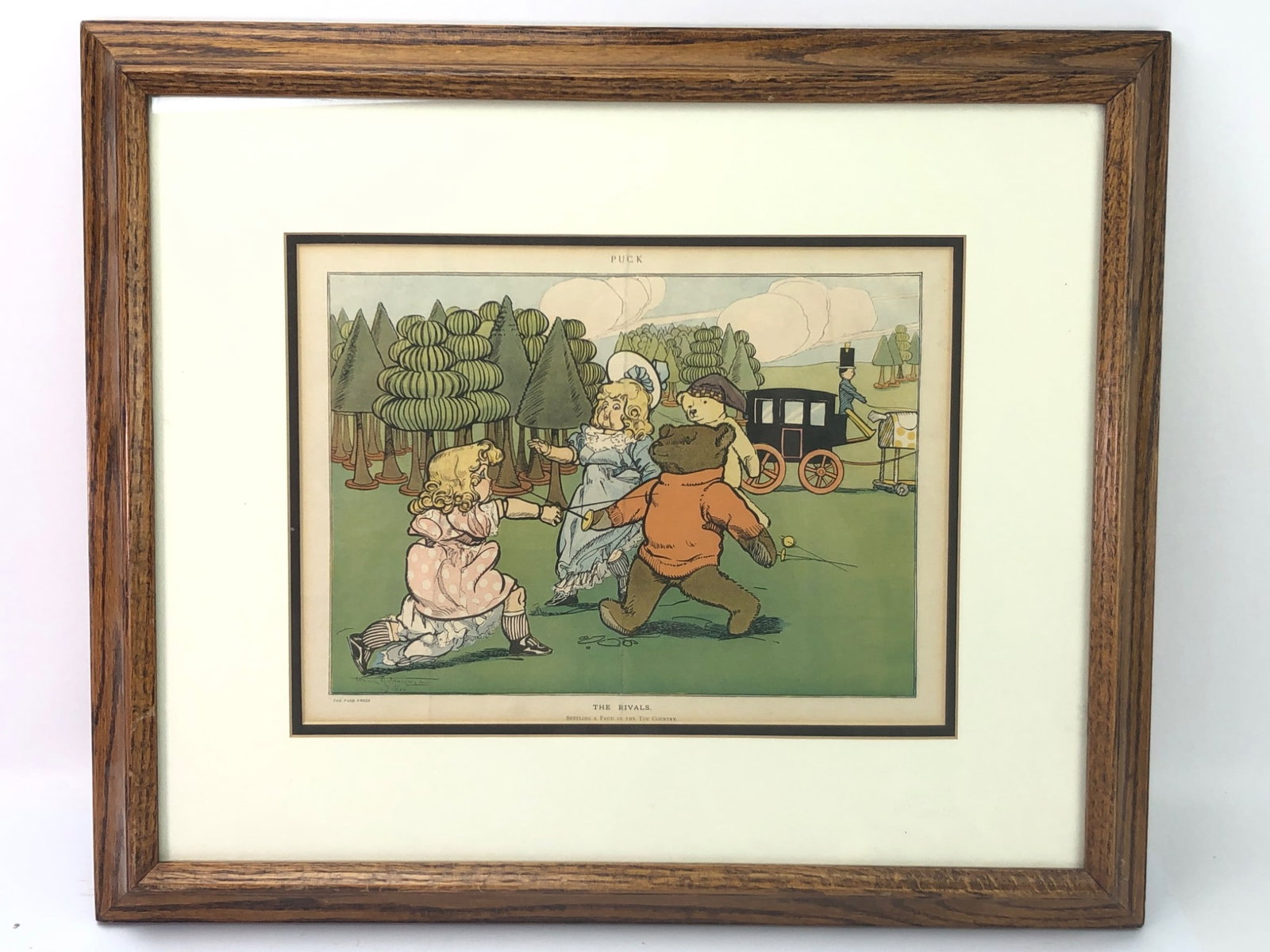 Framed Puck Press Illustration By Francis Attwood: Framed illustration by Francis Attwood, titled "The Rivals. Settling A Feud In The Toy Country," published by The Puck Press. Frame measures 21 1/4"x 17 3/4"with visible wear on the back paper. L5