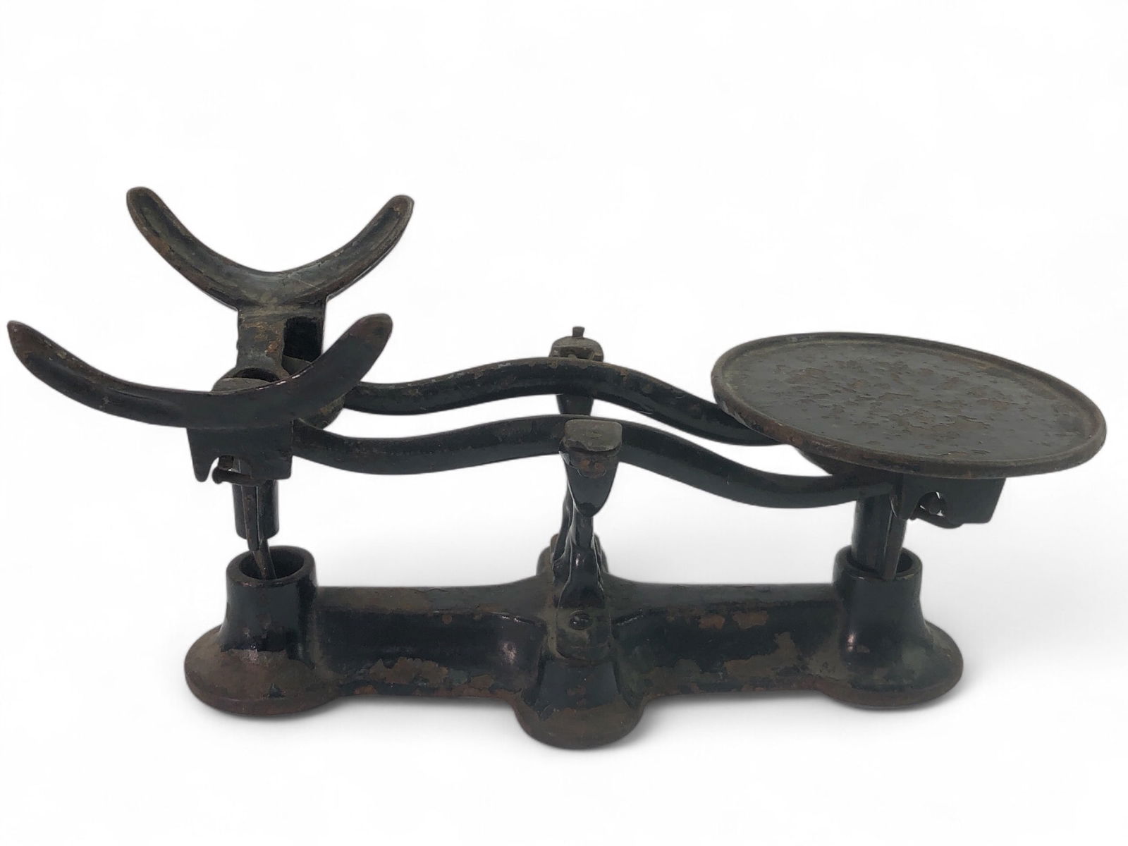Antique Iron Balance Scale: Antique iron balance scale measuring 11 inches in length. Features a flat weighing platform and a curved cradle holder. Constructed from cast? iron with visible wear and patina consistent with its age