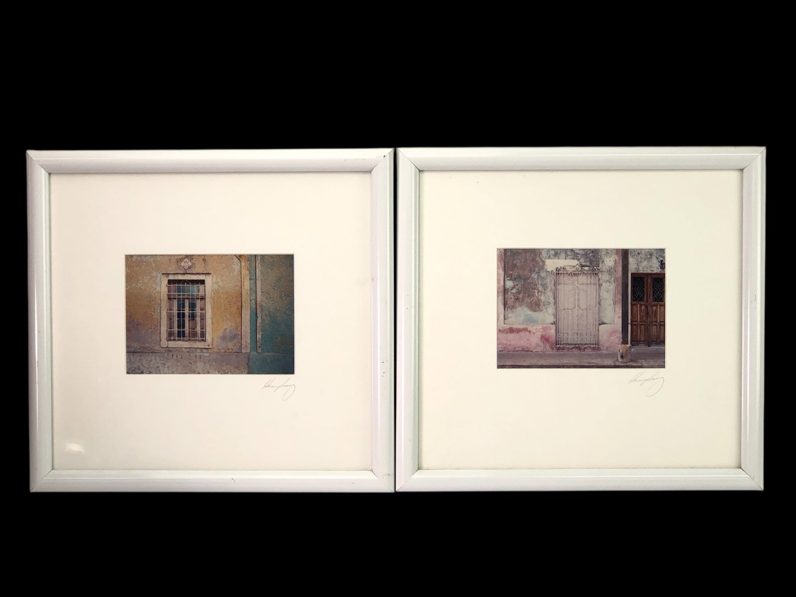 (2) Larry Humphrey Fine Art Photo Prints: Larry Humphrey fine art photographs titled "Merida, Mexico" with reference numbers #192 and #197. Each measures 14.5"x 13.5"in white frames. Pencil Signed by the artist. L7