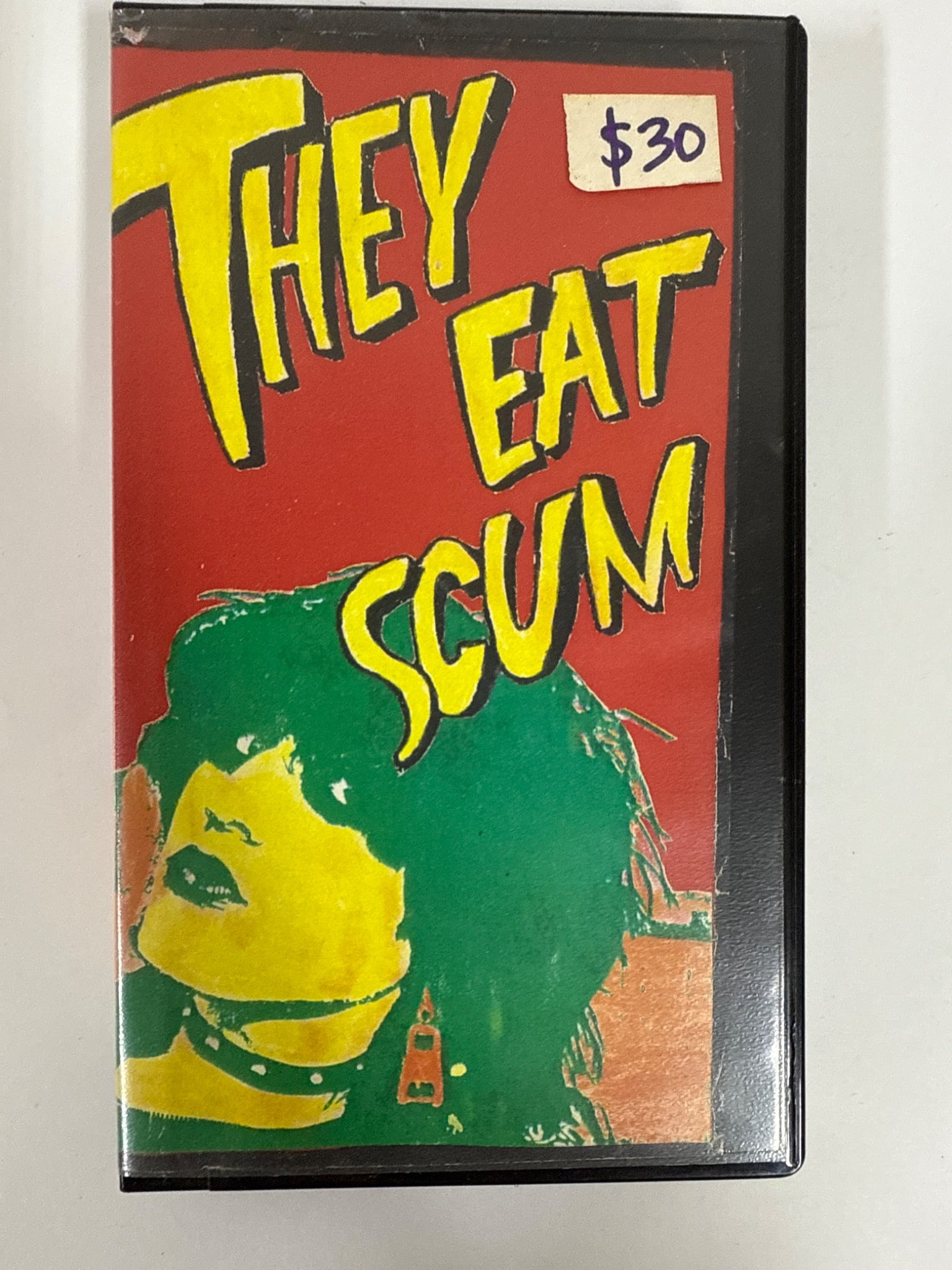 They Eat Scum VHS By Nick Zedd: Original VHS tape of 'They Eat Scum,' a 1979 film by Nick Zedd. Includes plastic case featuring cover art and textual details. Running time approximately 75 minutes. Distributed by Psychotronic Films