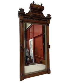 A Victorian Eastlake Carved Walnut Wall Mirror with Matching Shelf