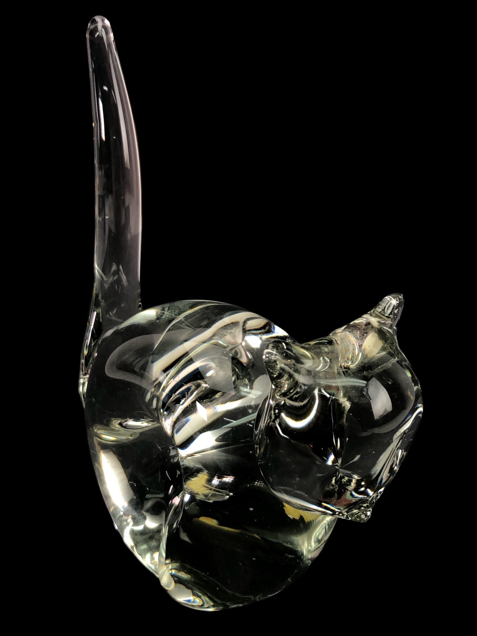 Italian Hand Made Crystal Cat Figurine by ACC: ACC hand made clear crystal cat figurine featuring a curled body and upright tail. Measures approximately 7 inches to the tip of the tail. Retains partial original label on the base.
