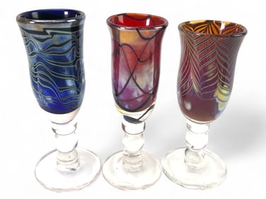 A Set of Three Charlie Miner Studio Art Glass Iridescent Goblets, 1988