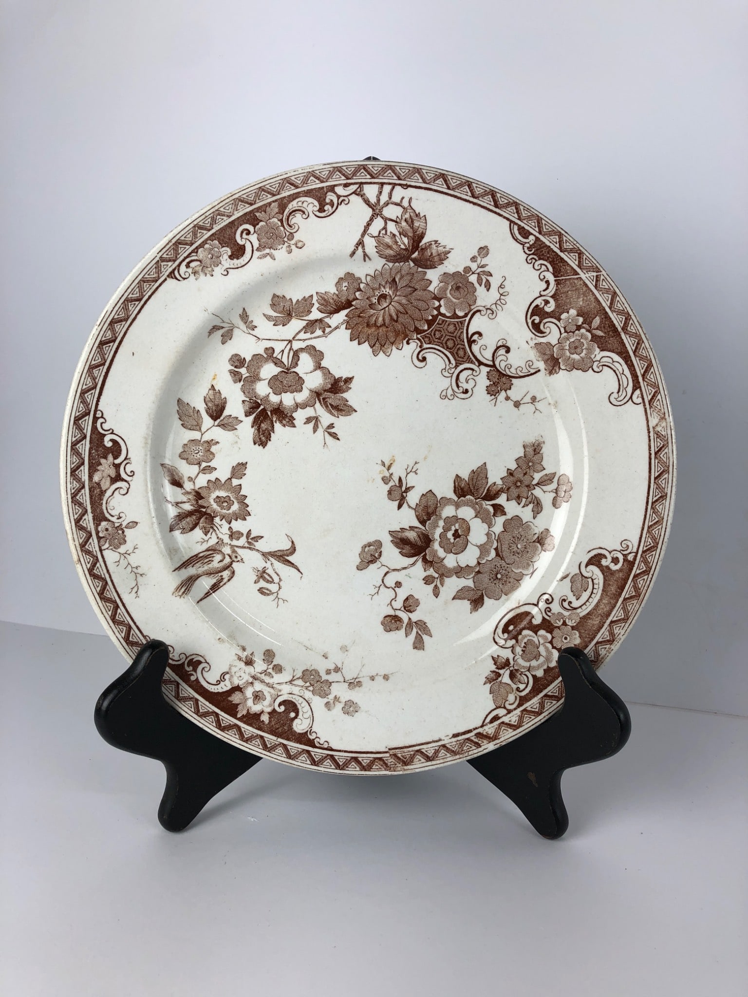 10.5? Belleek 1st Period Tranferware Plate: A 10.5-inch Belleek transferware plate from the 1st period, featuring intricate brown floral patterns. The back displays the 1st period Belleek mark. Includes visible crazing and signs of wear consist