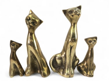 A Set of Four Mid-Century Modern Stylized Brass Cat Figurines