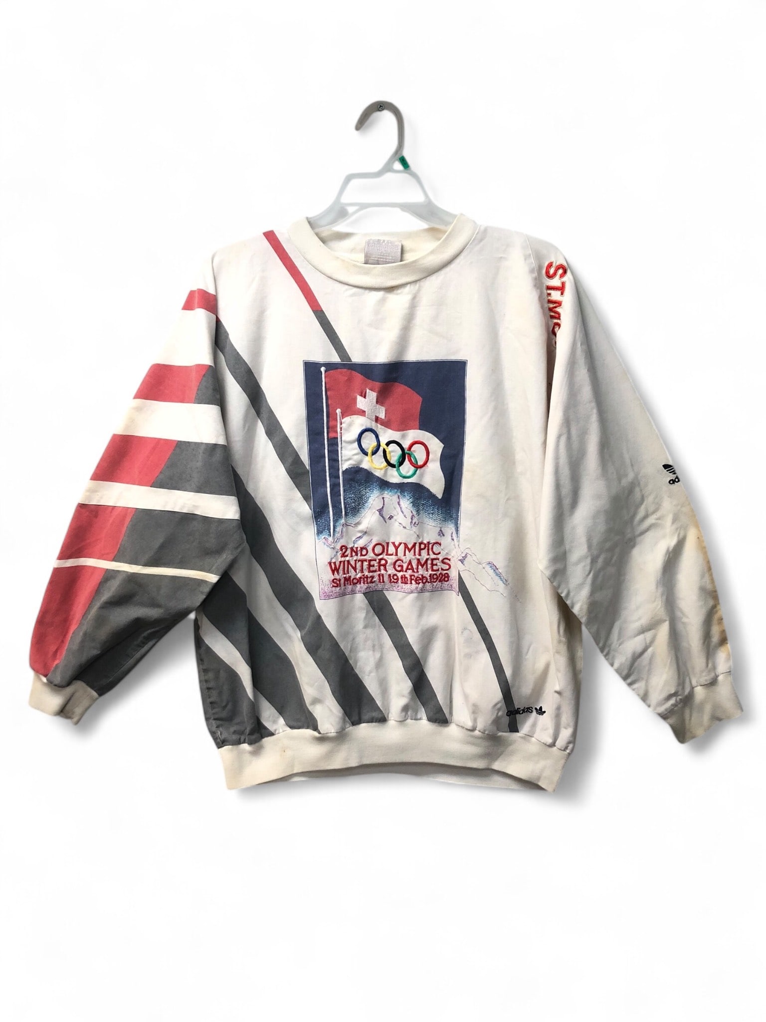 Vtg Adidas 2nd Olympic Winter Games Sweatshirt: Vtg Adidas sweatshirt featuring the 2nd Olympic Winter Games, St. Moritz 1928 design. Made in China, measuring 28.5 inches from shoulder to bottom and 27.5 inches armpit to armpit. Exhibits significan