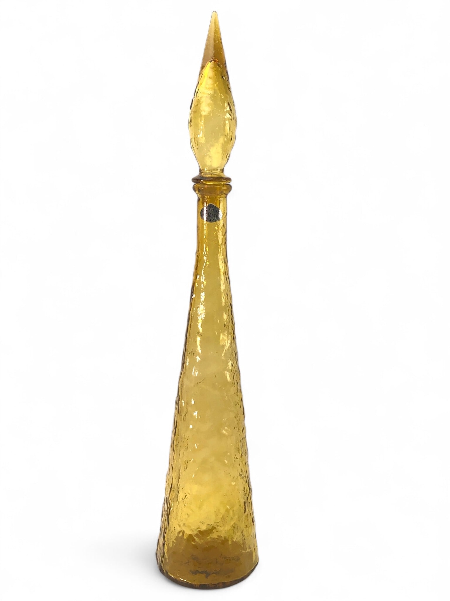 MCM Guildcraft Empoli Italy Genie Bottle Decanter: Mid-century modern Genie bottle decanter by Guildcraft Empoli Italy. Amber-toned glass with raised texture & a glass stopper. Measures 22.5 inches in height with the stopper in place. Marked 'Guildcra