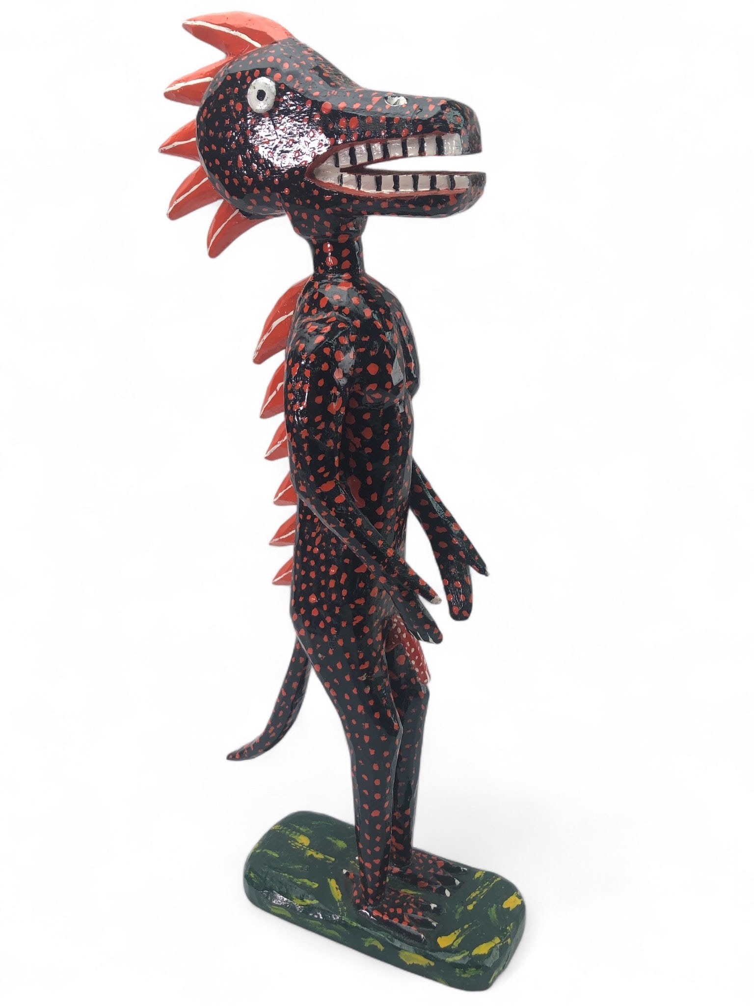 Freddy Acuna Costa Rican Carved Fertility Statue: Signed Freddy Acuna Costa Rican folk art fertility statue. Hand carved & hand painted wooden statue featuring a red & black spotted design with intricate details. Measures approximately 19 inches tall