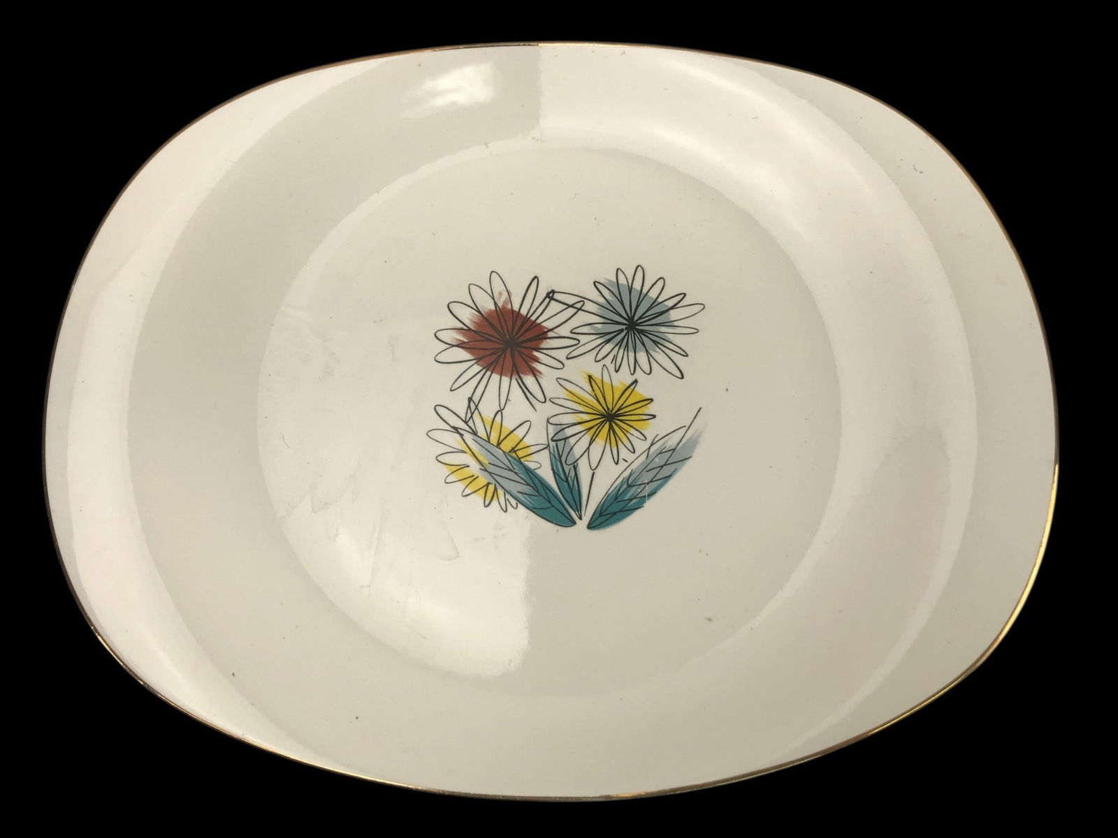Mcm Paden City Pottery Saxony Oval Serving Platter: Mid-century modern serving platter by Paden City Pottery. Featuring the 'Preview' pattern with a bone ash glaze. Floral motif in the center with gold trim. Measures 14 inches wide. Some wear visible o