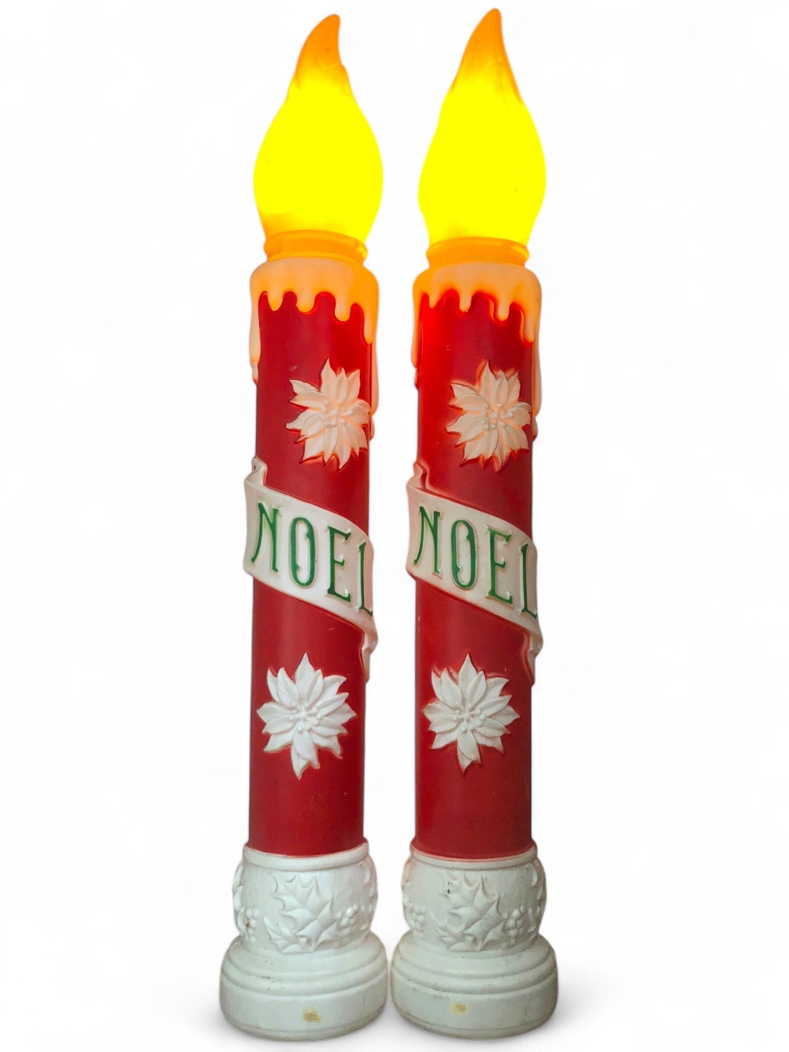 Vtg Carolina Enterprises Noel Blow Mold Pair: Vintage Carolina Enterprises Christmas Noel blow molds measuring 38.5 inches tall. Red with white and green accents, featuring ‘Noel’ text and floral designs. Tested and functional, with some wear